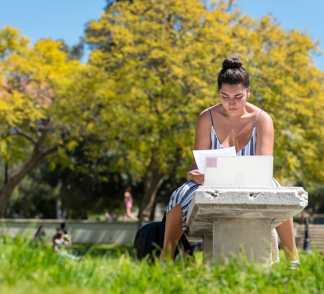 Student studying on Occidental campus