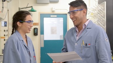 Cheyenne Orozco '20 and Assistant Professor Raul Navarro in a Norris Hall of Chemistry lab in July 2019.