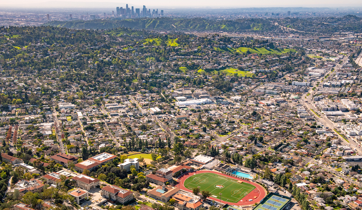 Aerial image of campus with Los Angeles skyline in the background