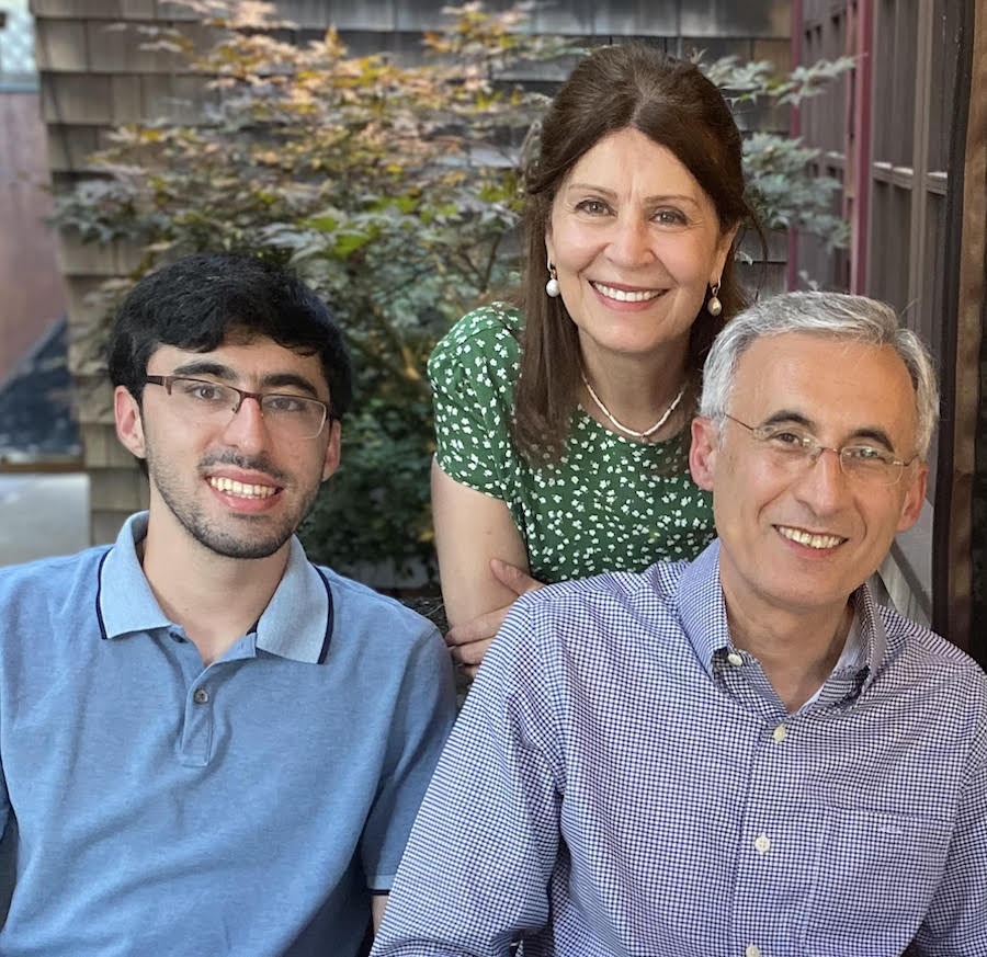 The Mohebbi family are shown together, smiling.