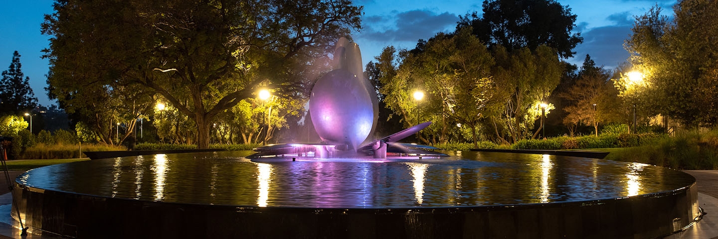 Gilman fountain illuminated at night